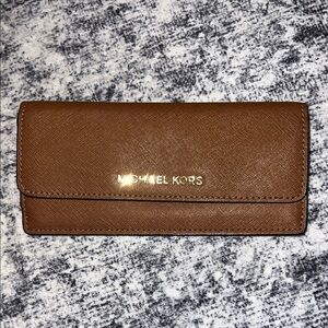 Michael Kors saffiano leather wallet in luggage